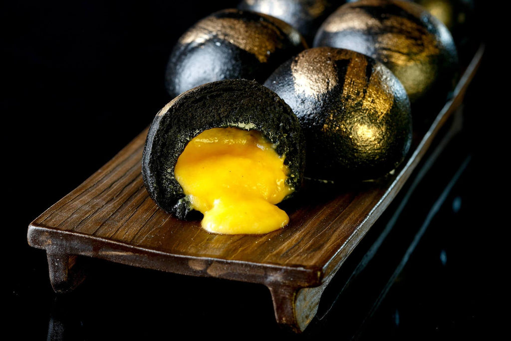 Puréed Egg Yolk in Cuttlefish Ink Dough Bun - 黑金流沙包 - Kirin Fine Foods